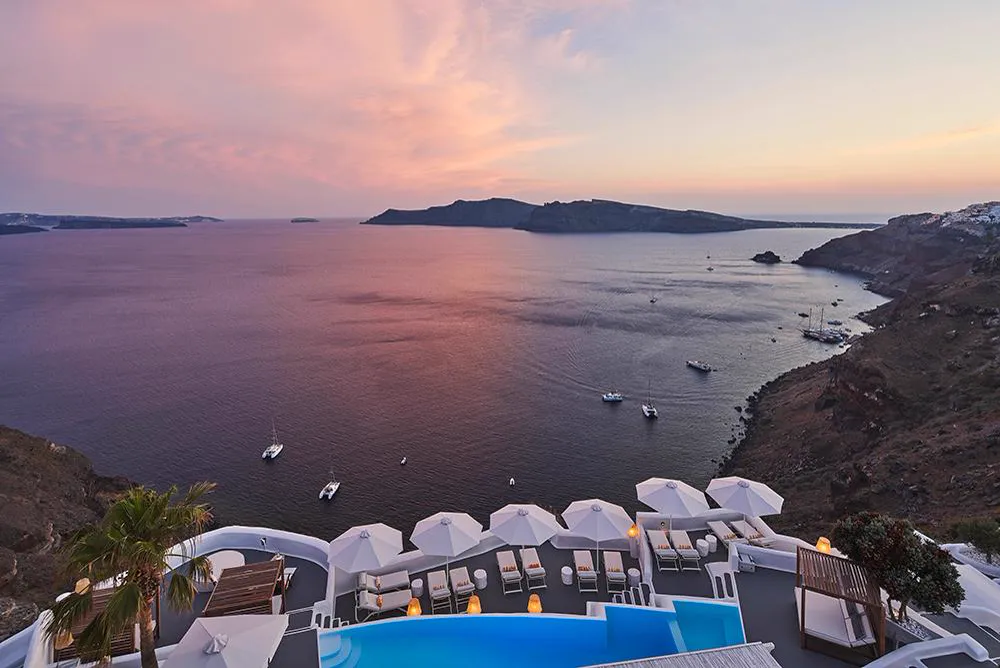 Pool and caldera at sunset