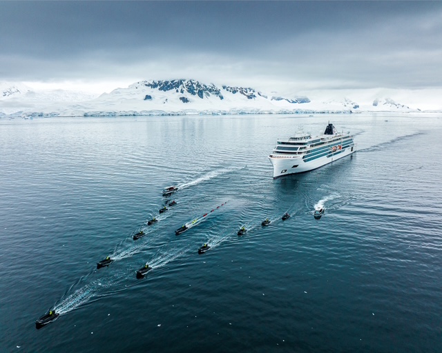 Viking expedition ship with zodiac fleet in Antarctic waters
