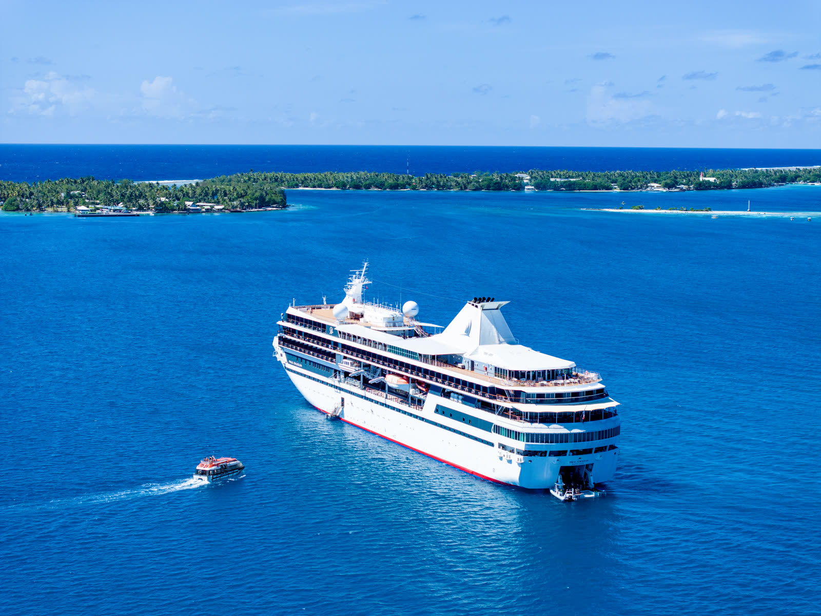 The m/s Paul Gauguin at anchor in a Polynesian lagoon